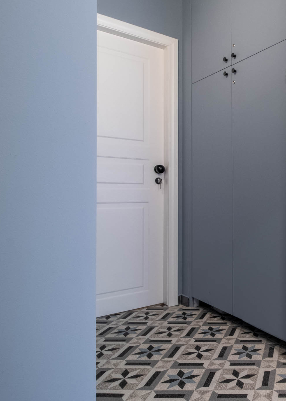 Corridoio piastrelle graniglia